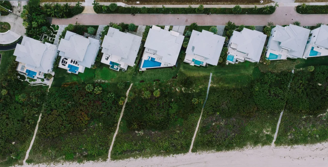 Aerial view of a suburban neighborhood of detached family homes