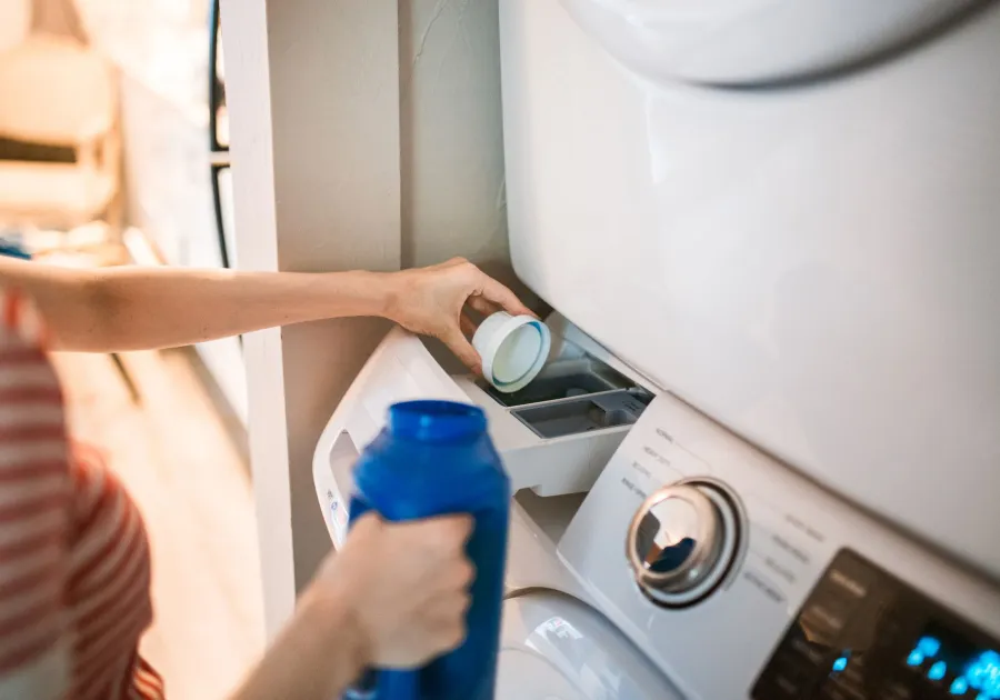 Front load washing machine in a tidy home laundry room